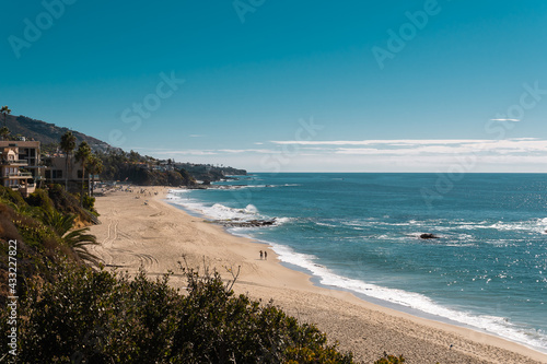 sunny beach with people coast los angeles