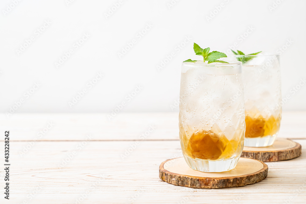 iced plum juice with soda and peppermint