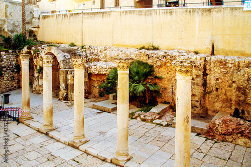 Ancient Roman Road Known as the Cardo Maximus in the Old City of Jerusalem. In 1969, excavations in Jewish Quarter revealed what appeared to be ancient Roman road and row of Corinthian columns. © Kira