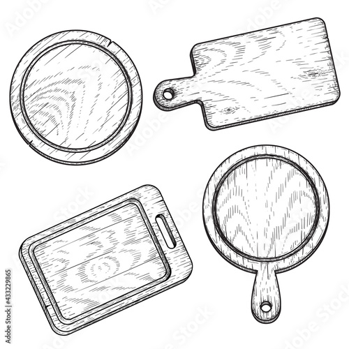 Hand drawn cutting wooden boards set. Sketch style kitchen utensils. Top view. Round and rectangular, with handle. Vector illustrations vintage collection.