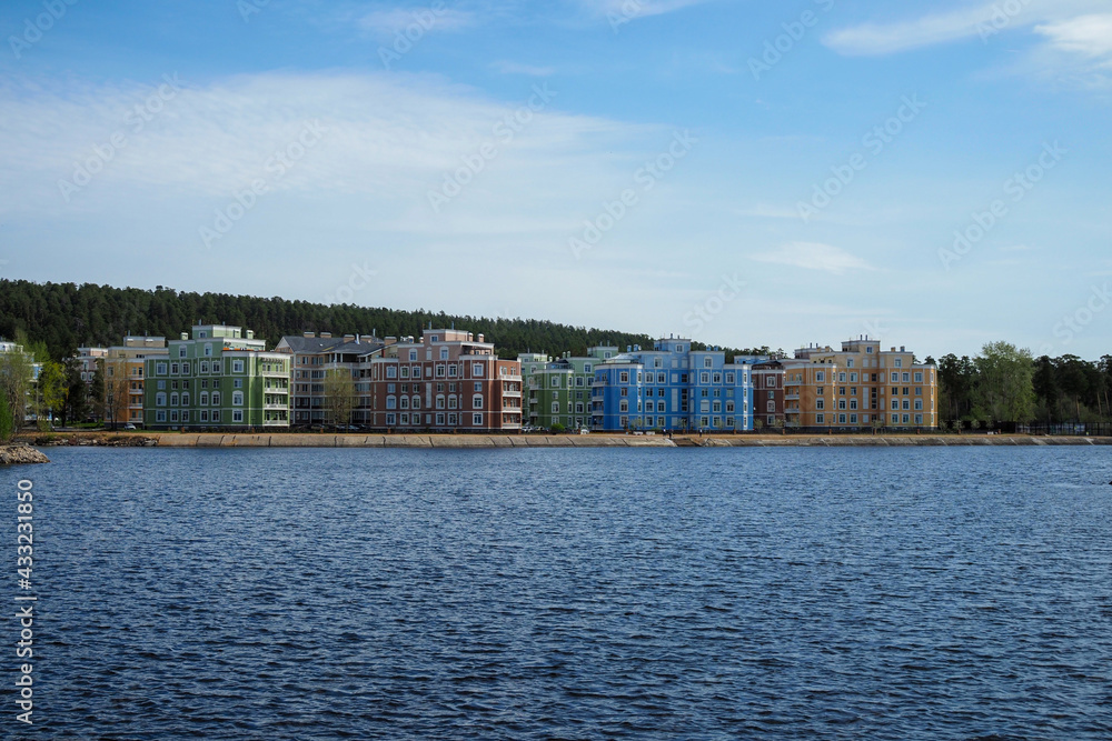 Fototapeta premium Row of colorful houses nea the sea or river