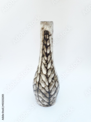 Mid-century modern ceramic vase with leaf pattern isolated