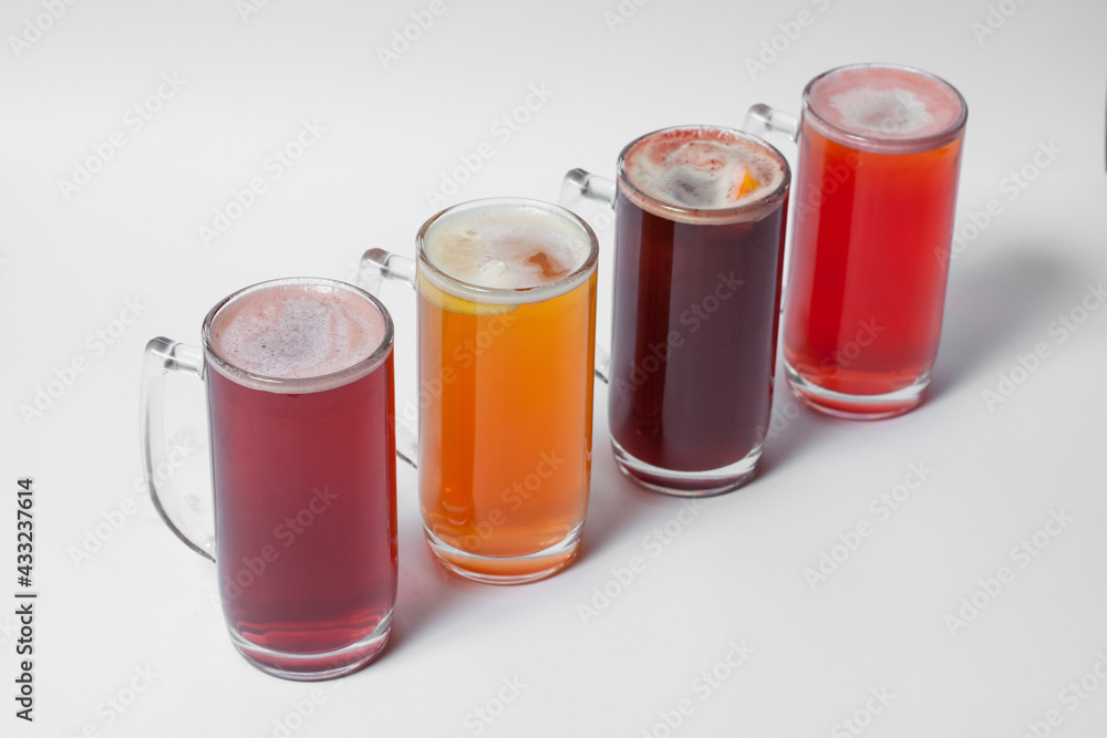 craft and colored beer set in mugs isolated craft and colored beer set in mugs isolated