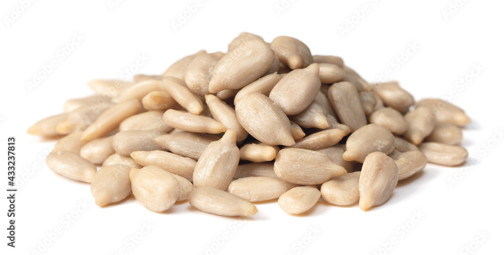 pile of peeled sunflower seeds isolated on white background pile of peeled sunflower seeds isolated on white background