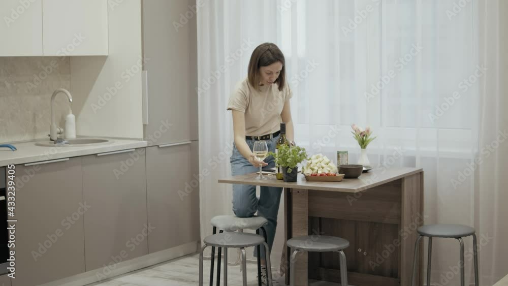 Woman preparing dinner at home Woman preparing dinner at home