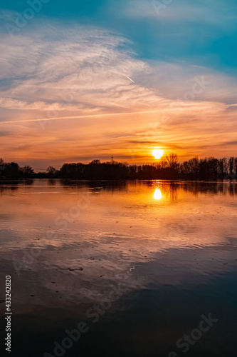 Beautiful sunset with reflections near Plattling  Isar  Bavaria  Germany