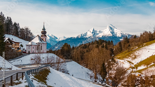 Beautiful winter view with the famous Watzmann summit and a church in the background at Maria Gern, Berchtesgaden, Bavaria, Germany