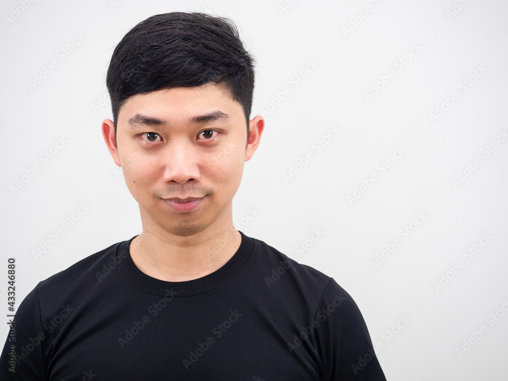 Closeup face of Asian man portrait look confeident and smile on white background Closeup face of Asian man portrait look confeident and smile on white background