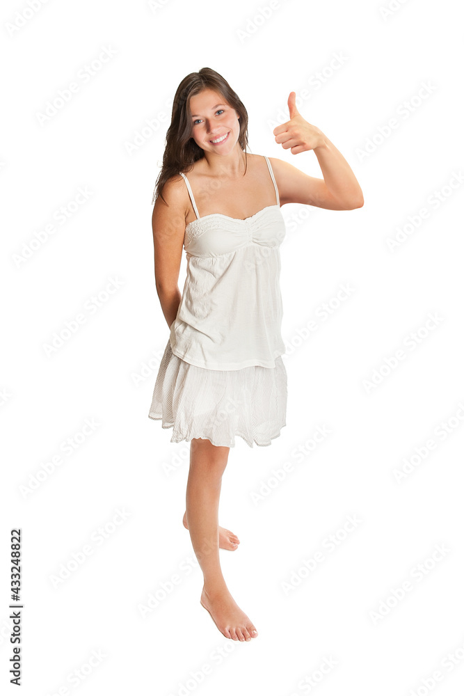Full length portrait of a happy young woman with her thump up in the air, isolated on white studio background Full length portrait of a happy young woman with her thump up in the air, isolated on white studio background