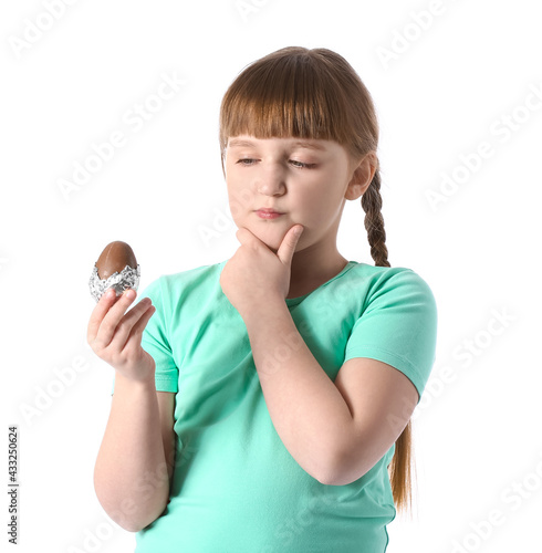 Thoughtful little girl with...