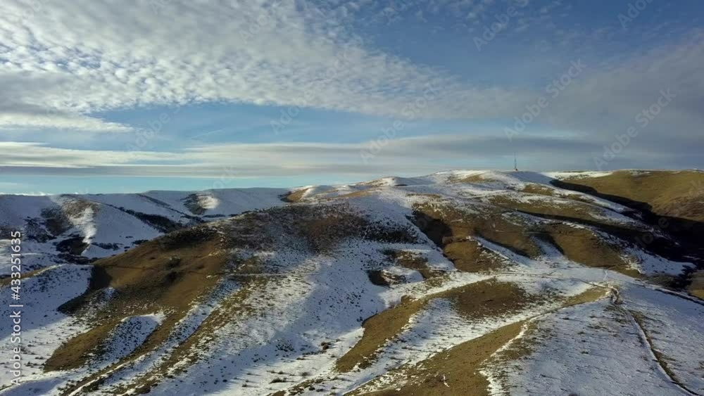 A colorful pan over a snow-capped butte. A colorful pan over a snow-capped butte.