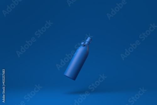Blue Milk bottle floating in blue background. minimal concept idea creative. monochrome. 3D render.