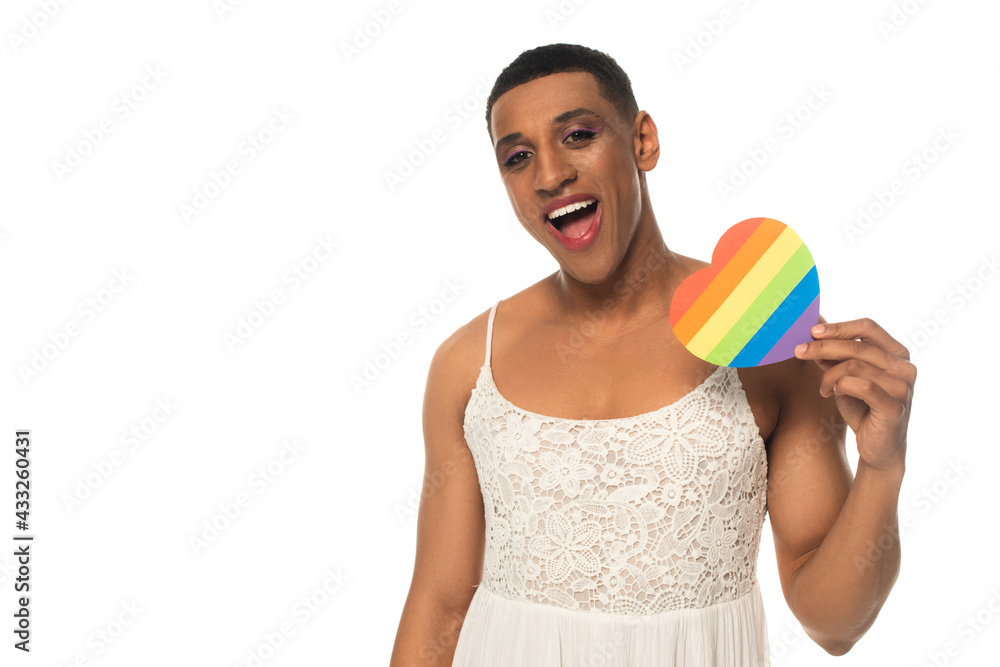 amazed african american transsexual man holding lgbt colors paper heart isolated on white amazed african american transsexual man holding lgbt colors paper heart isolated on white