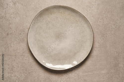  brown ceramic plate and bowl