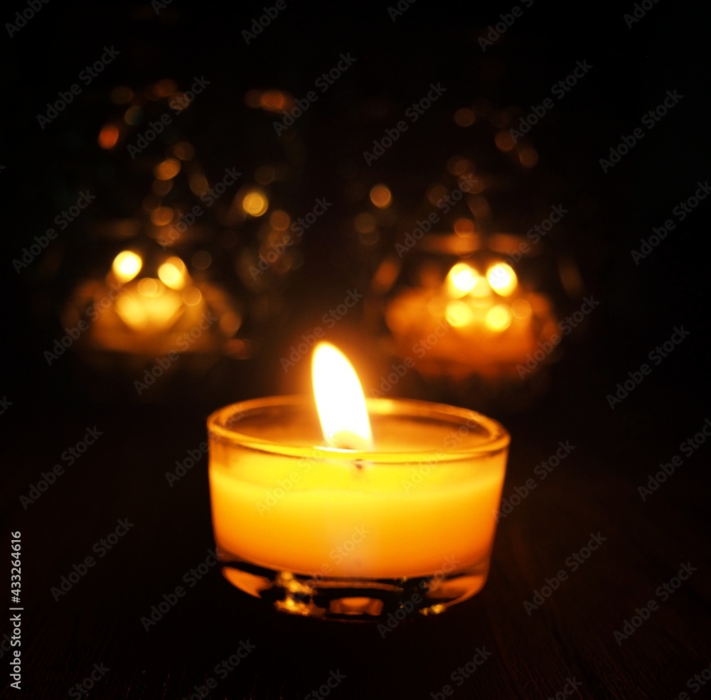 burning candles in the dark