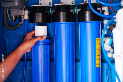 фотографія Water filter system or osmosis, Replacing the water filter, water-purification