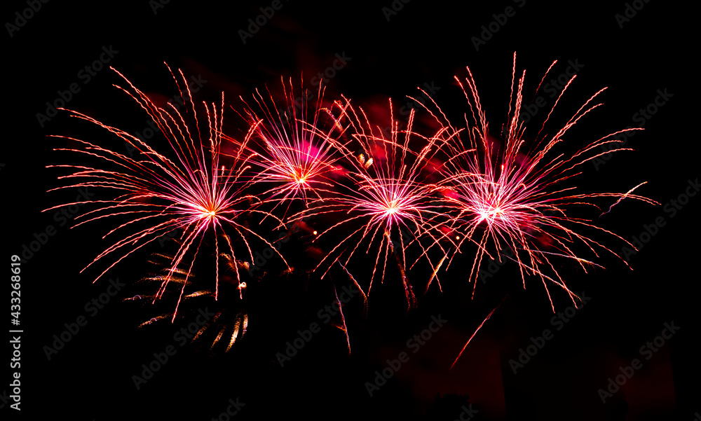 Bright festive fireworks against the night sky. Firework Fiery flowers during the holiday. Bright festive fireworks against the night sky. Firework Fiery flowers during the holiday.