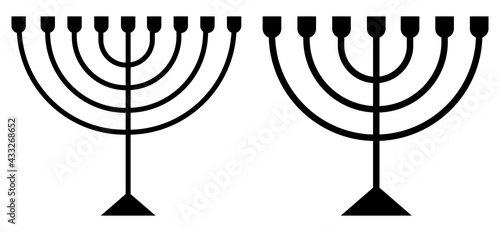 Hanukkah Menorah candelabrum black sign isolated on white. Religion icon. Silhouette of sacred jewish object.