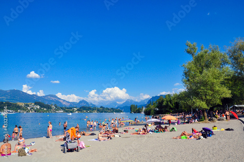 Crowd of people enjoying holiday in Ufschötti, Lucerne, Switzerland.