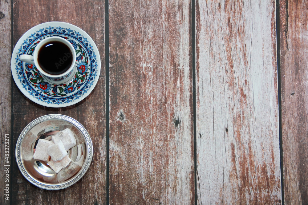 black turkish coffee in a mug and sweet lukum black turkish coffee in a mug and sweet lukum