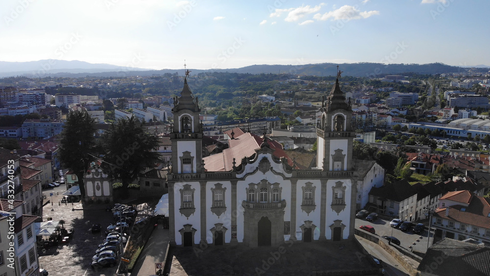Viseu, Portugal - May 8, 2021: DRONE AERIAL VIEW - Front facade at the Church of Mercy, Igreja da Misericordia, baroque style monument, architectural icon of the city of Viseu, in Portugal.