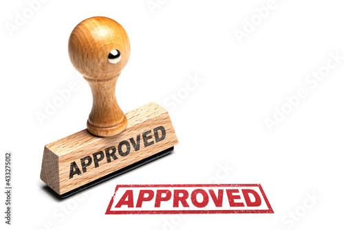 Canvas Print close-up of wooden APPROVED rubber stamp and red imprint isolated on white backg