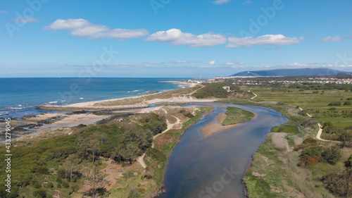 Bild auf Leinwand DRONE AERIAL VIEW: The mouth and estuary of Neiva River in Castelo do Neiva, Viana do Castelo, Portugal