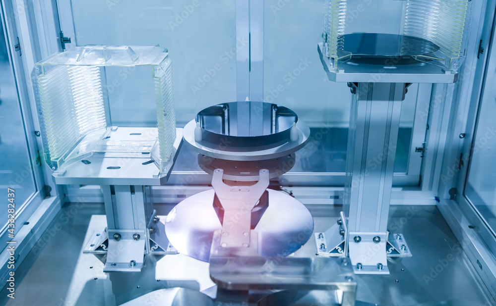 Silicon Wafers and Microcircuits with Automation system control application on automate robot arm Silicon Wafers and Microcircuits with Automation system control application on automate robot arm