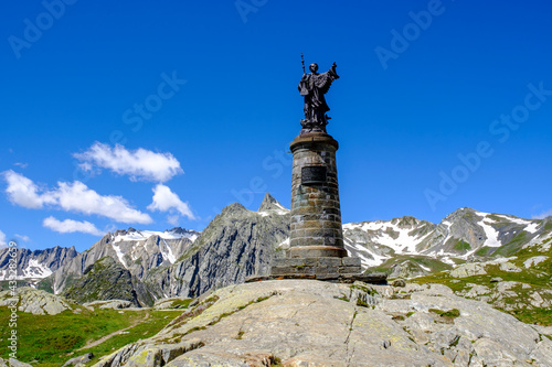Italy, Aosta Valley, Statue of Saint Bernard at Great Saint Bernard Pass photo
