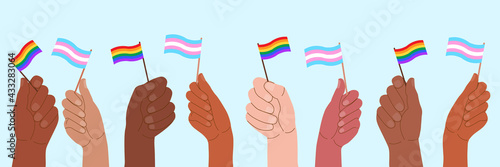 People hold flags with LGBT symbols, support for transgender and lesbian people.