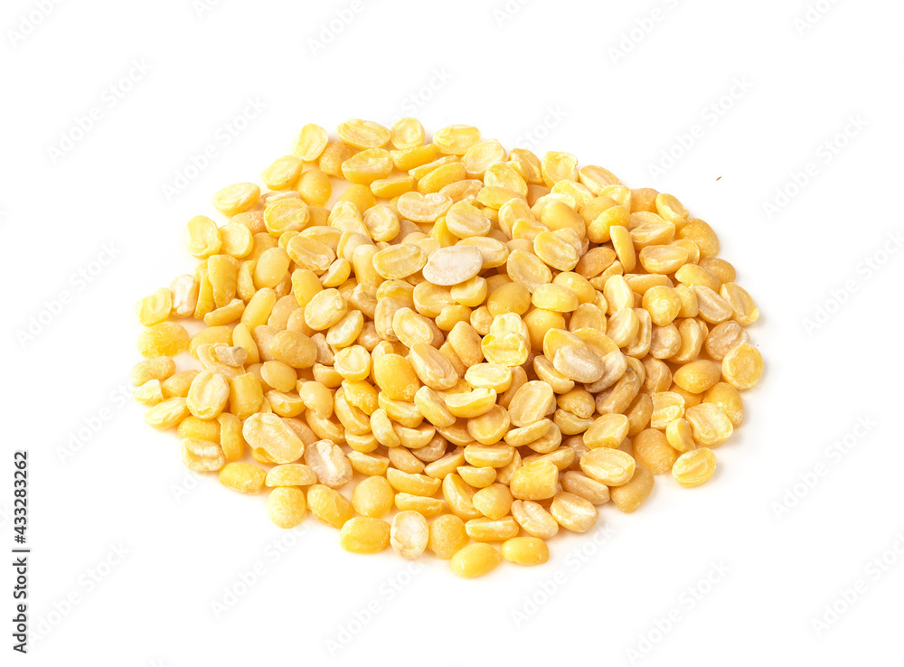 handful of raw moong dal beans closeup on white handful of raw moong dal beans closeup on white