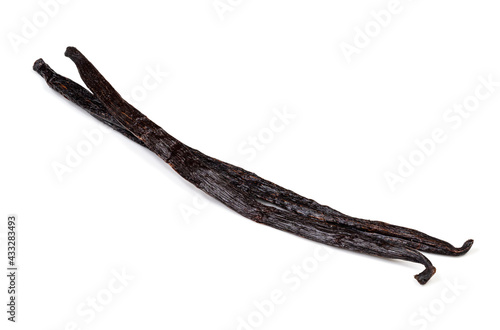 two different dried vanilla beans closeup on white