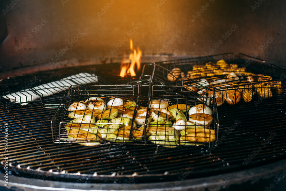 Cooking vegetables on the grill in the kitchen at the restaurant Cooking vegetables on the grill in the kitchen at the restaurant