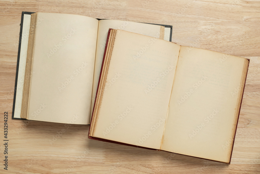 two open old book on wooden table for mockup blank template two open old book on wooden table for mockup blank template