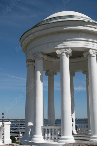 Columns. This photo can be used to show an example of ancient structures, to show the contrast of buildings and the bright blue sky. It will be the perfect background for your desktop.