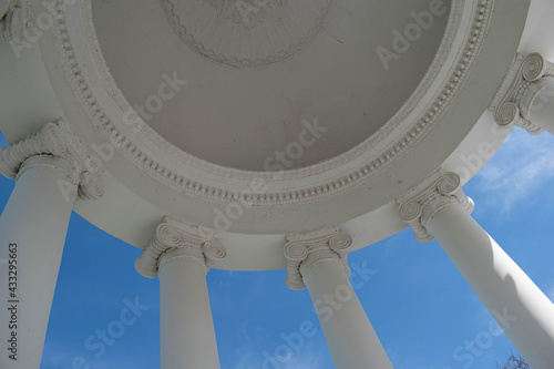 Columns. This photo can be used to show an example of ancient structures, to show the contrast of buildings and the bright blue sky. It will be the perfect background for your desktop.