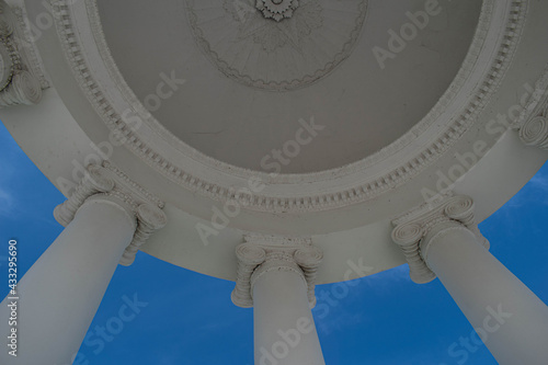 Columns. This photo can be used to show an example of ancient structures, to show the contrast of buildings and the bright blue sky. It will be the perfect background for your desktop.