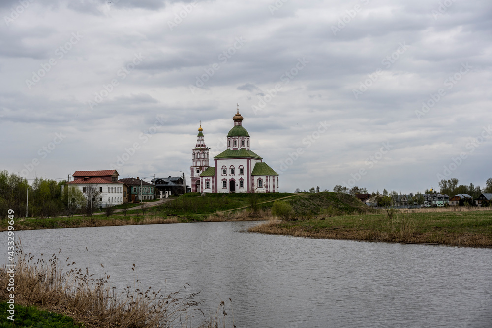 city views of the old kremlin churches and the monastery of the city of Suzdal during the rain