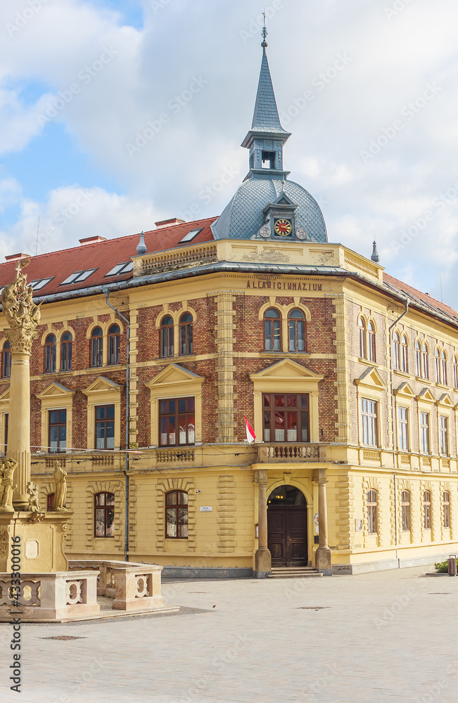 Trinity Column and high school in Main Square, Keszthely, Lake Balaton, Hungary, Europe