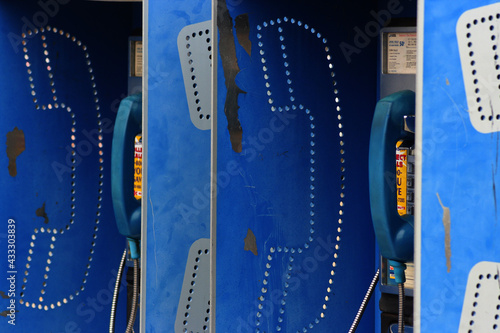 Old Blue Payphone Telephone Phone Booth to call located in Missouri Talk Speak Communicate 