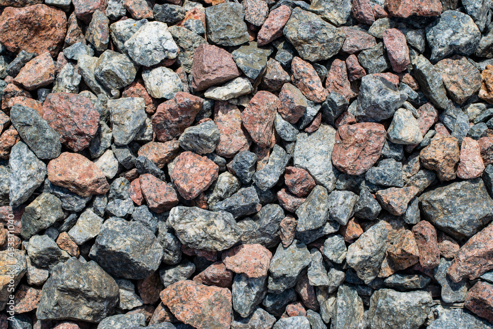 Crushed close up different stone texture background Crushed close up different stone texture background