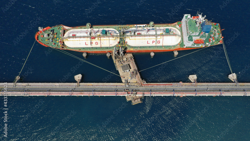 Aerial drone photo of industrial LPG tanker anchored in Mediterranean refinery port