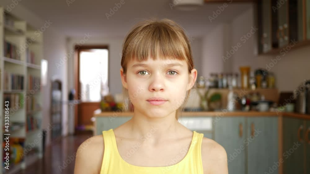 Cute girl kid portrait sit watching to camera at home Cute girl kid portrait sit watching to camera at home