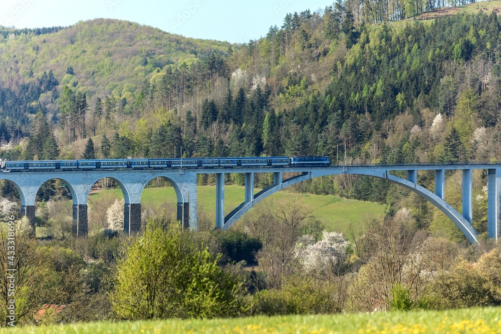 Railway bridge in spring in the Czech Republic of the village Dolni Loucky. Train transport. Spring morning in the countryside. Railway bridge in spring in the Czech Republic of the village Dolni Loucky. Train transport. Spring morning in the countryside.