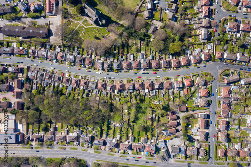 Straight down aerial photo of the British town of Meanwood in Leeds West Yorkshire showing typical UK housing estates and rows of houses in the spring time on a sunny day photo