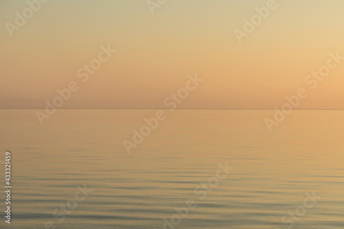 romantic sunset in orange colors at the sea