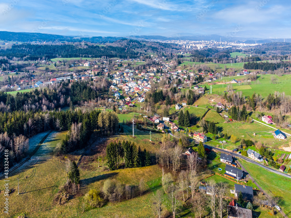 Naklejka premium View of Lucany nad Nisou in Jizera Mountains, Czech Republic. Aerial view from drone.