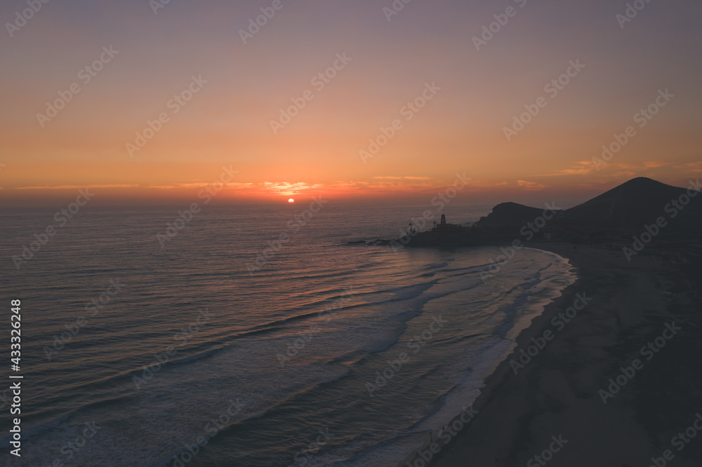 Beautiful pink sunset at Cerritos beach in Baja California Sur