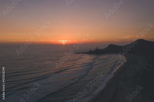 Beautiful pink sunset at Cerritos beach in Baja California Sur