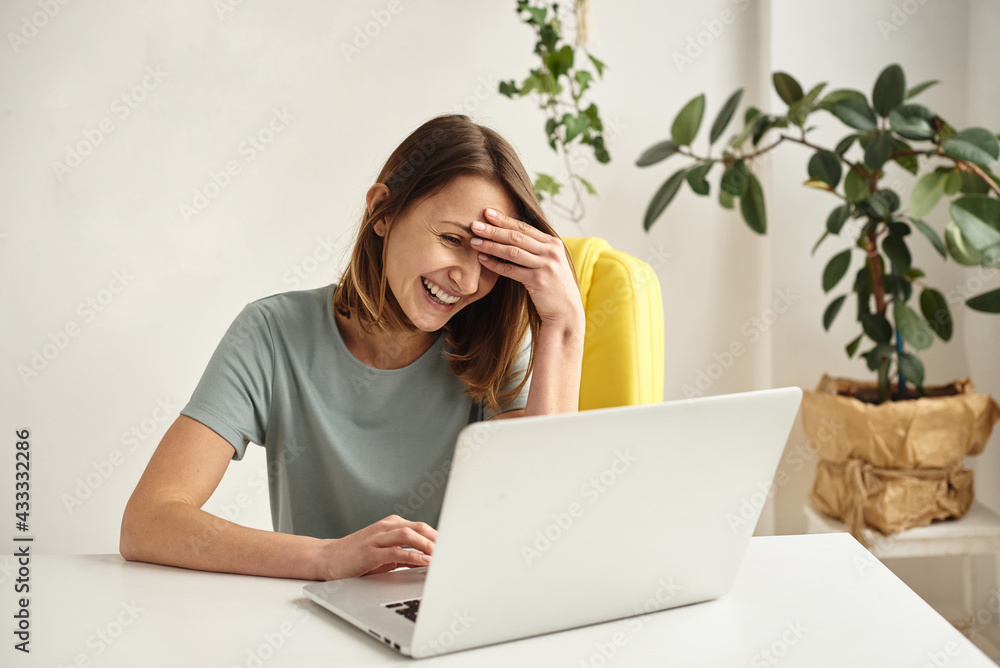 woman working on computer at home woman working on computer at home